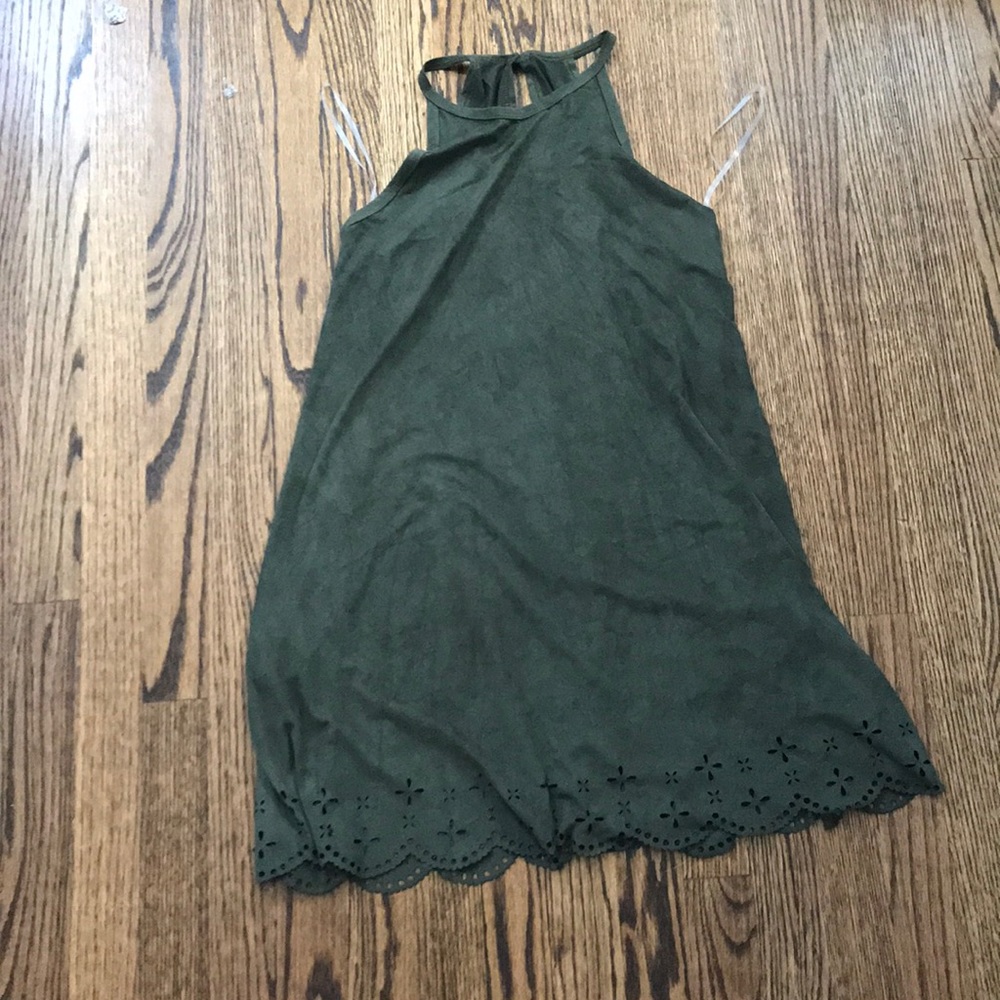 Green shift dress with detailing on the bottom
